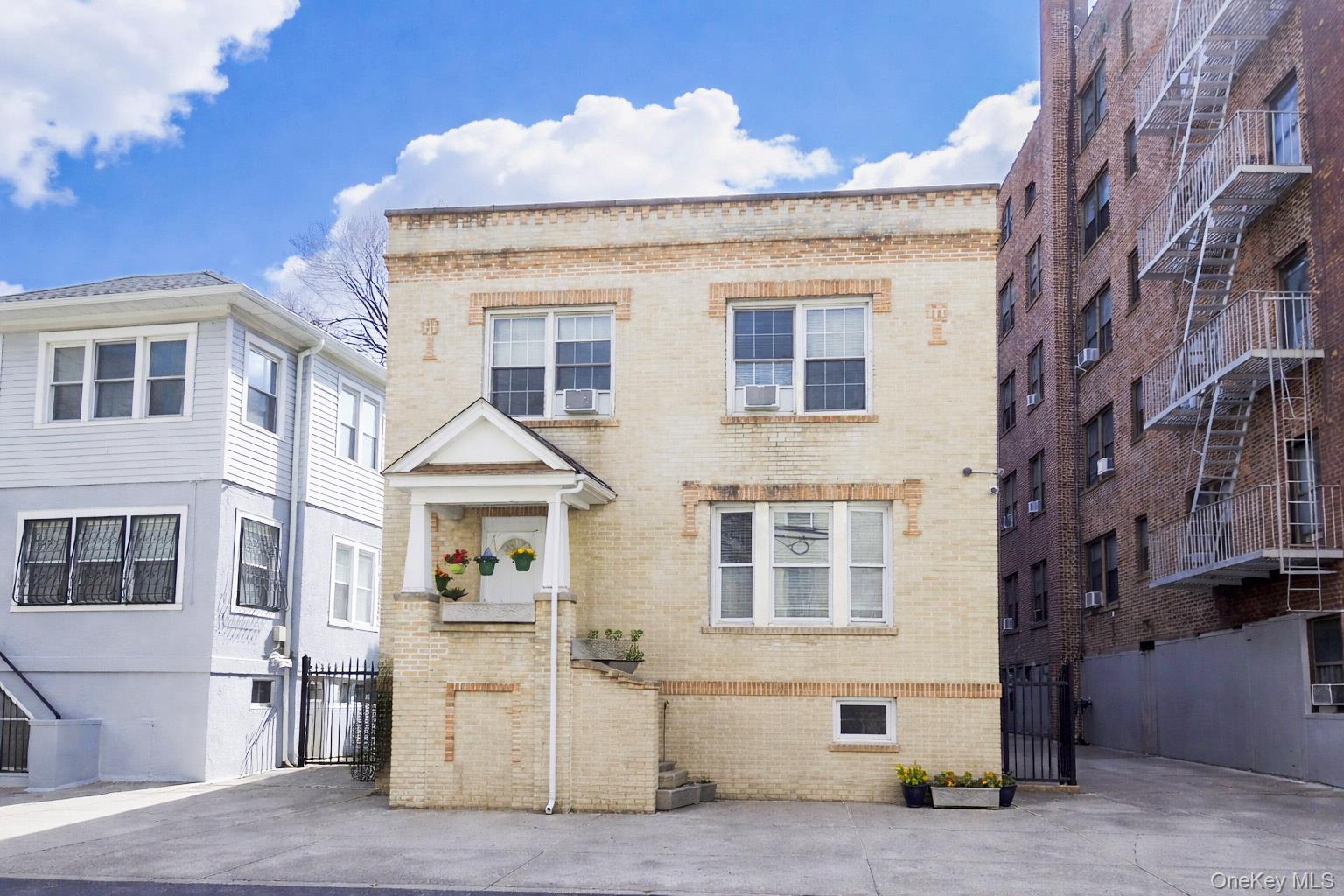 Welcome to this multi-family property offering two generous apartments...