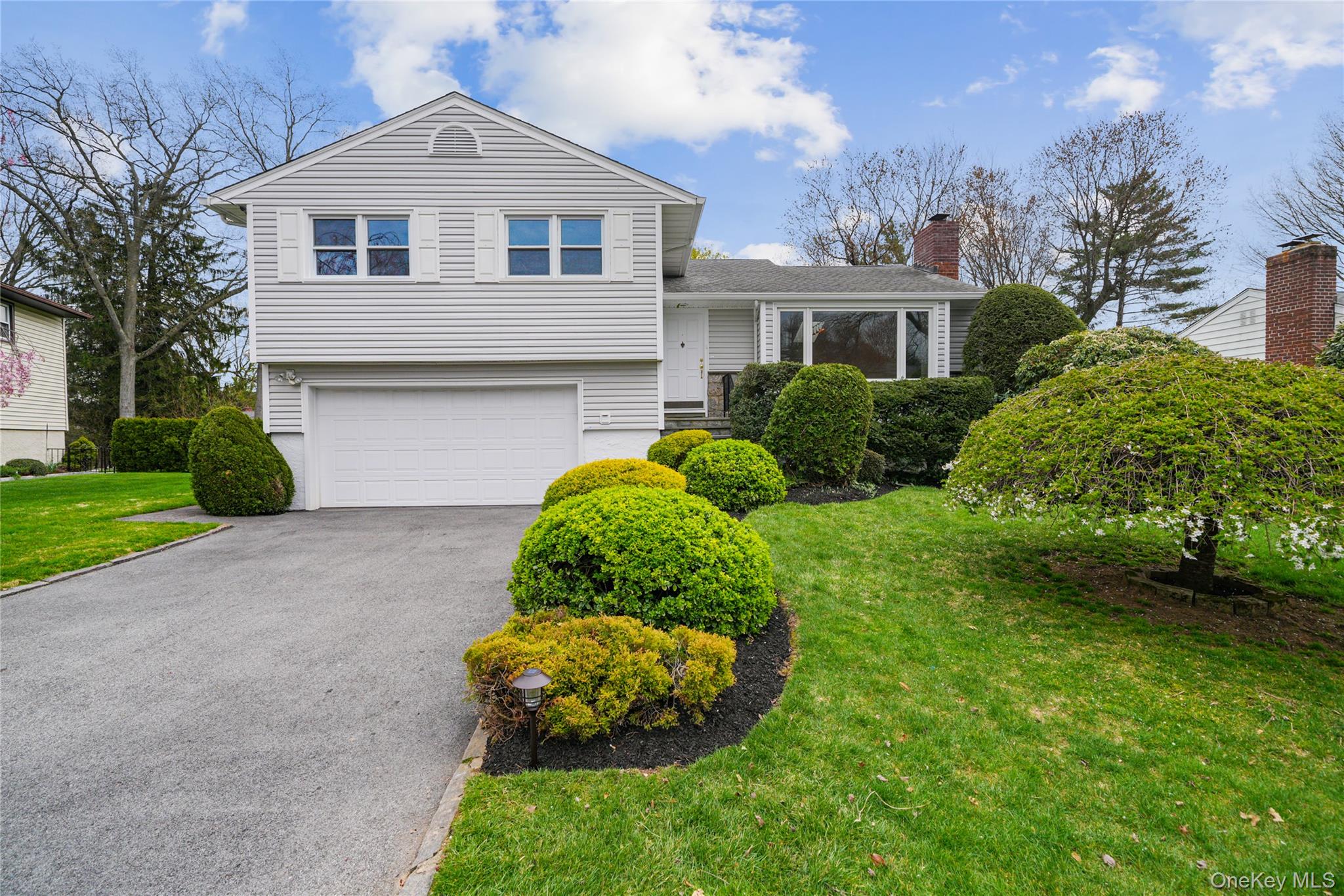 Move right into this well-maintained split-level home set on beautiful...