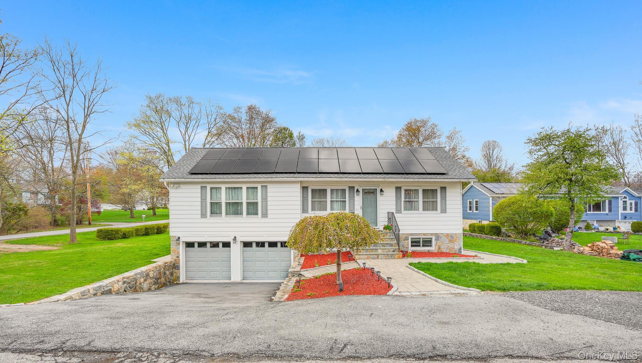 You’ll love this impressive raised ranch–style home, enhanced by the a...