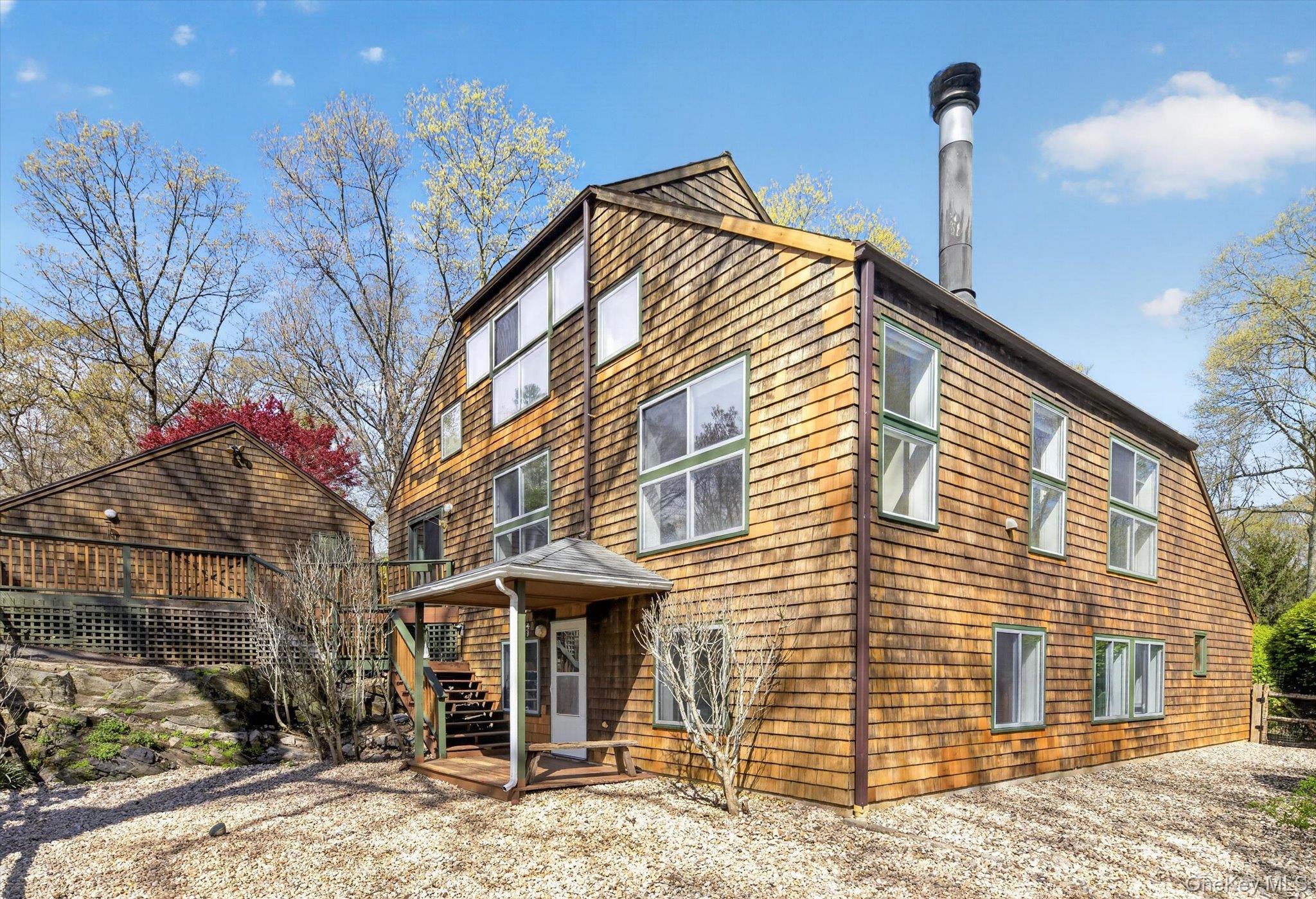 Tucked away on a quiet lane in North Salem, this one-of-a-kind contemp...