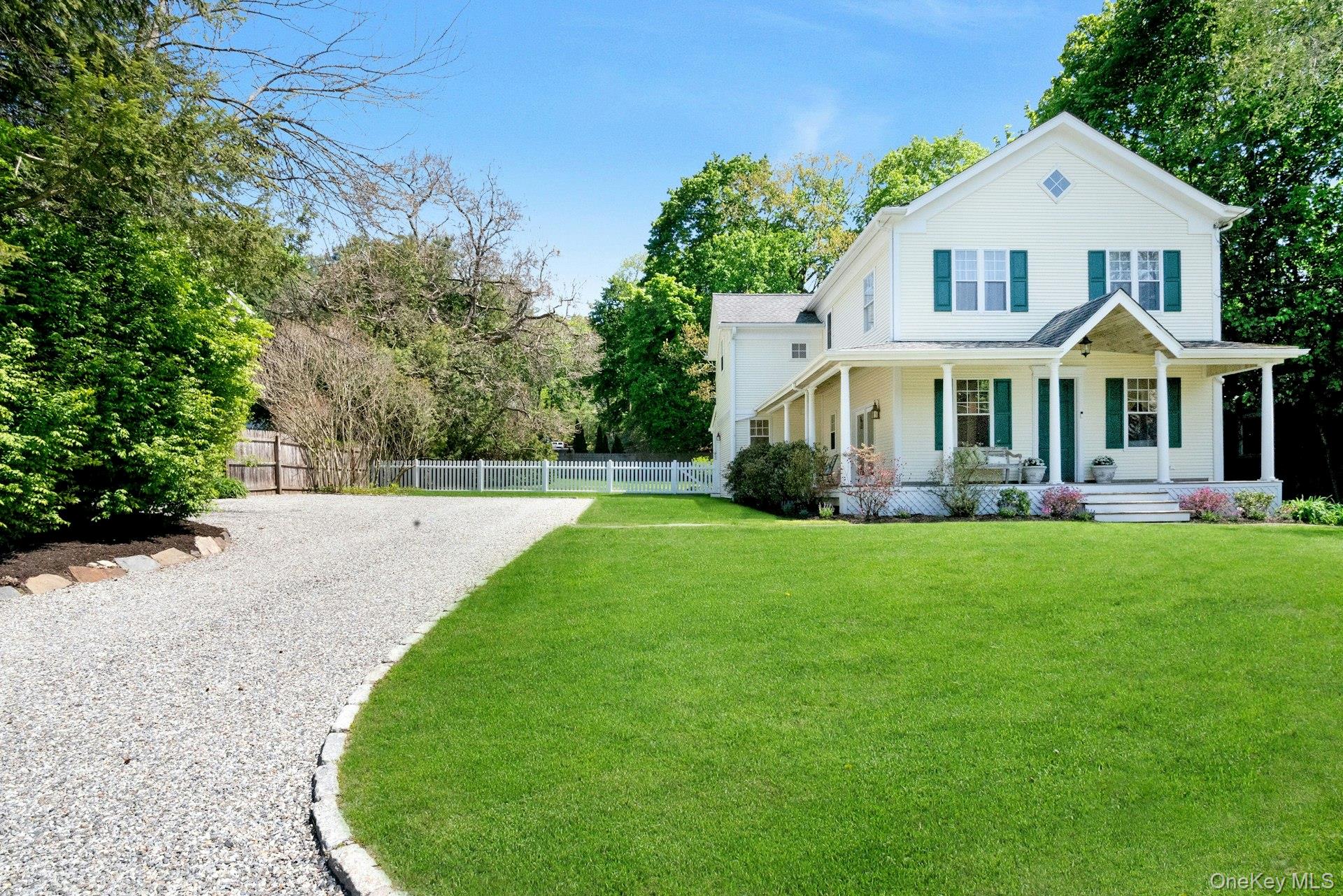 Exceptional curb appeal, this classic updated farmhouse is just minute...