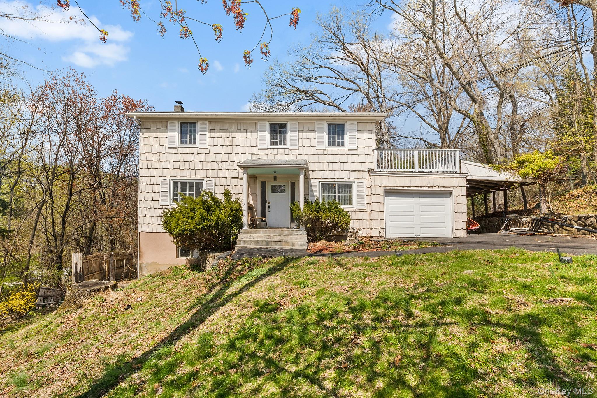 Set back on a quiet cul-de-sac and on over an acre of land, this spaci...