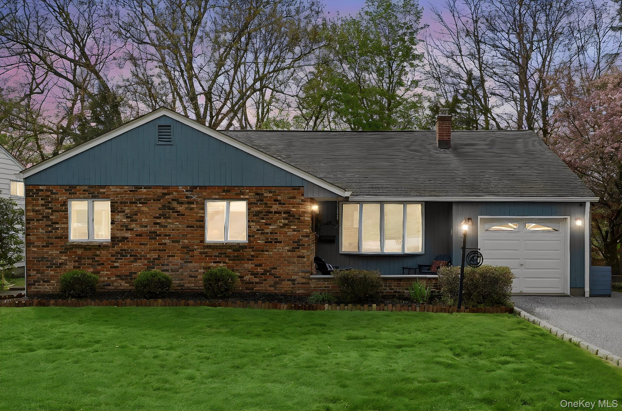 Well-maintained and filled with natural light, this inviting split-lev...