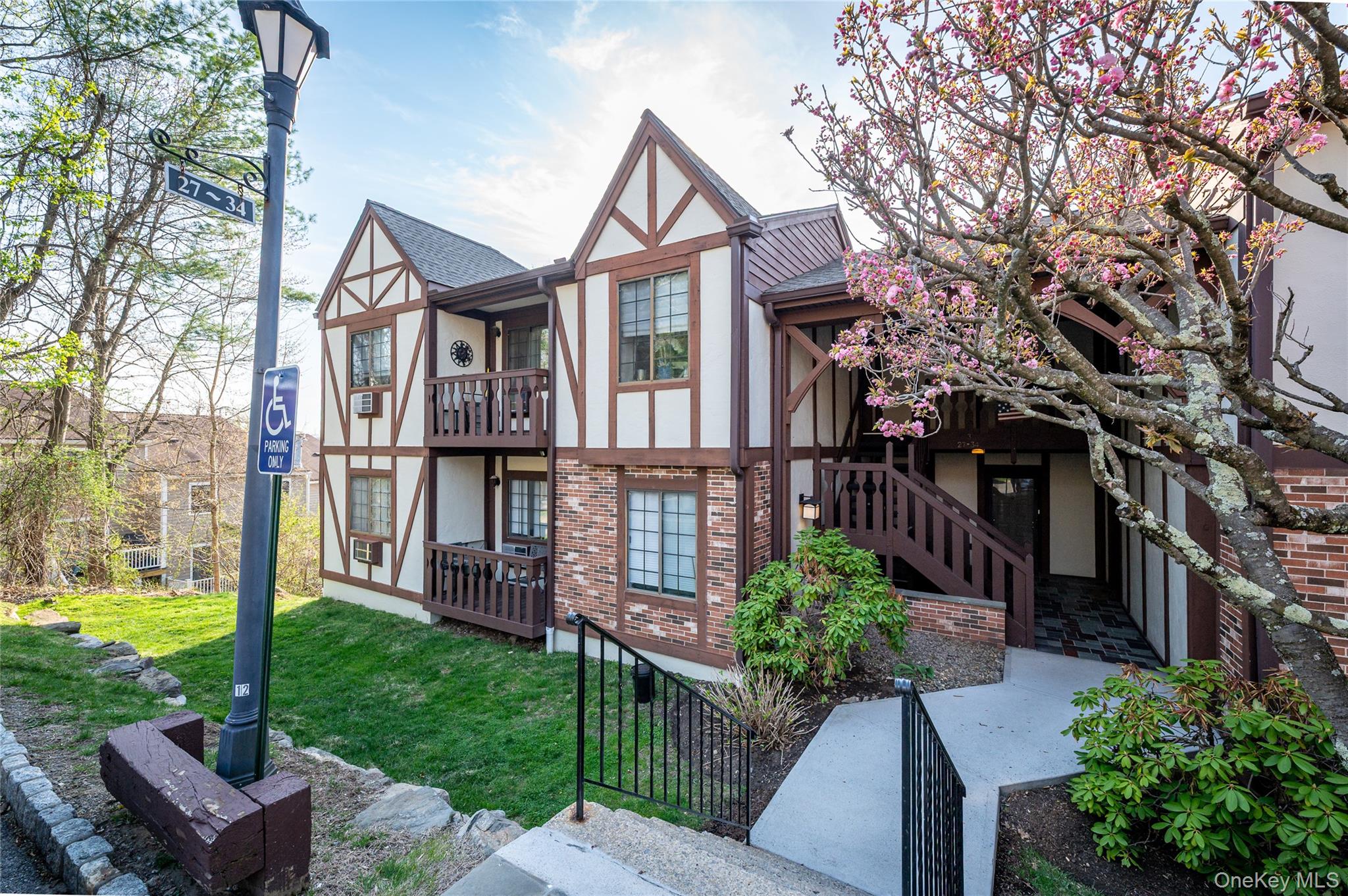 Lovely lower level, end unit condominium with beautiful views. Very pr...