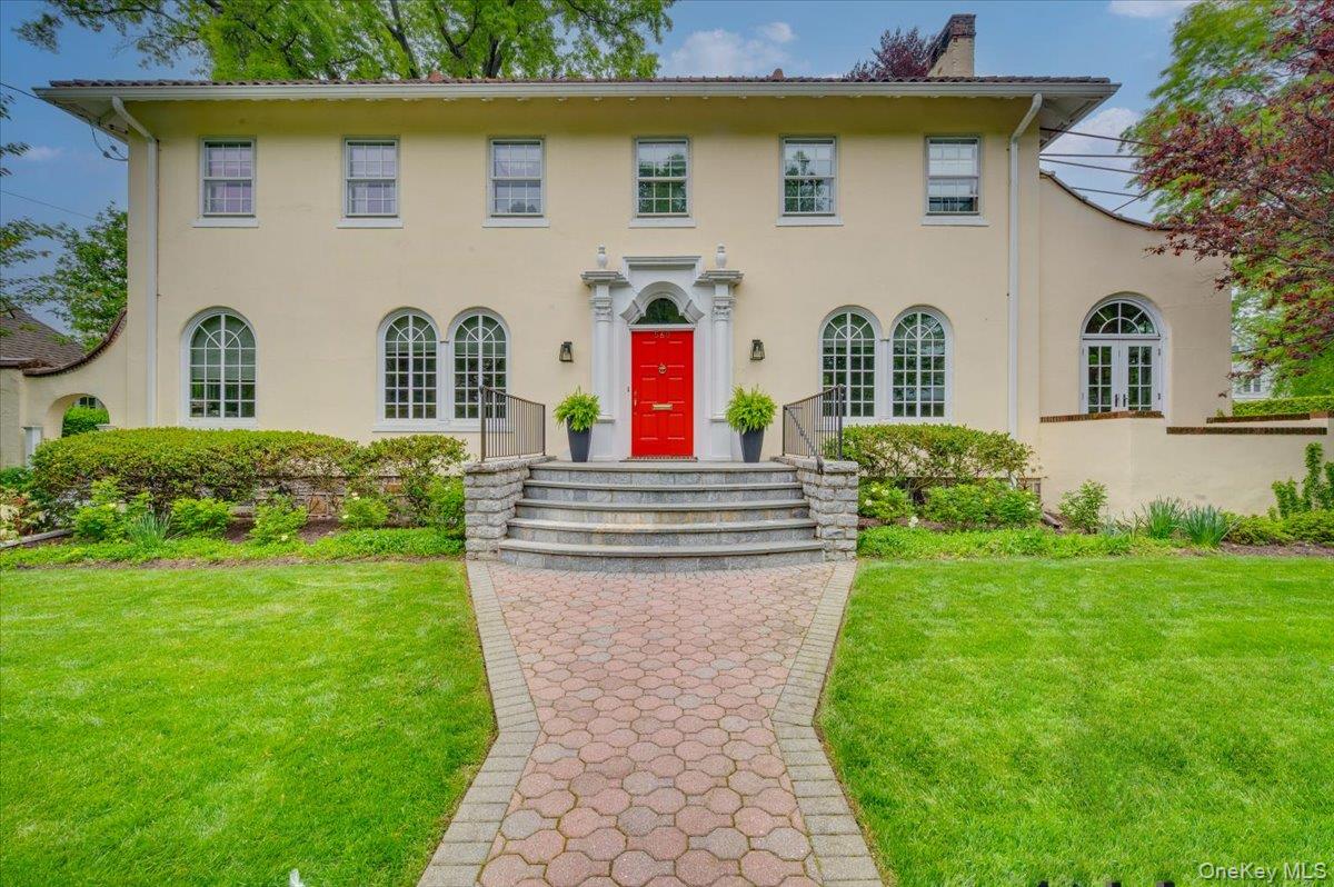 This sun-filled 1925 Mediterranean-style Colonial, defined by beautifu...