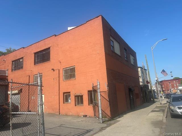 Positioned in a prime Yonkers location, this versatile corner mixed-us...