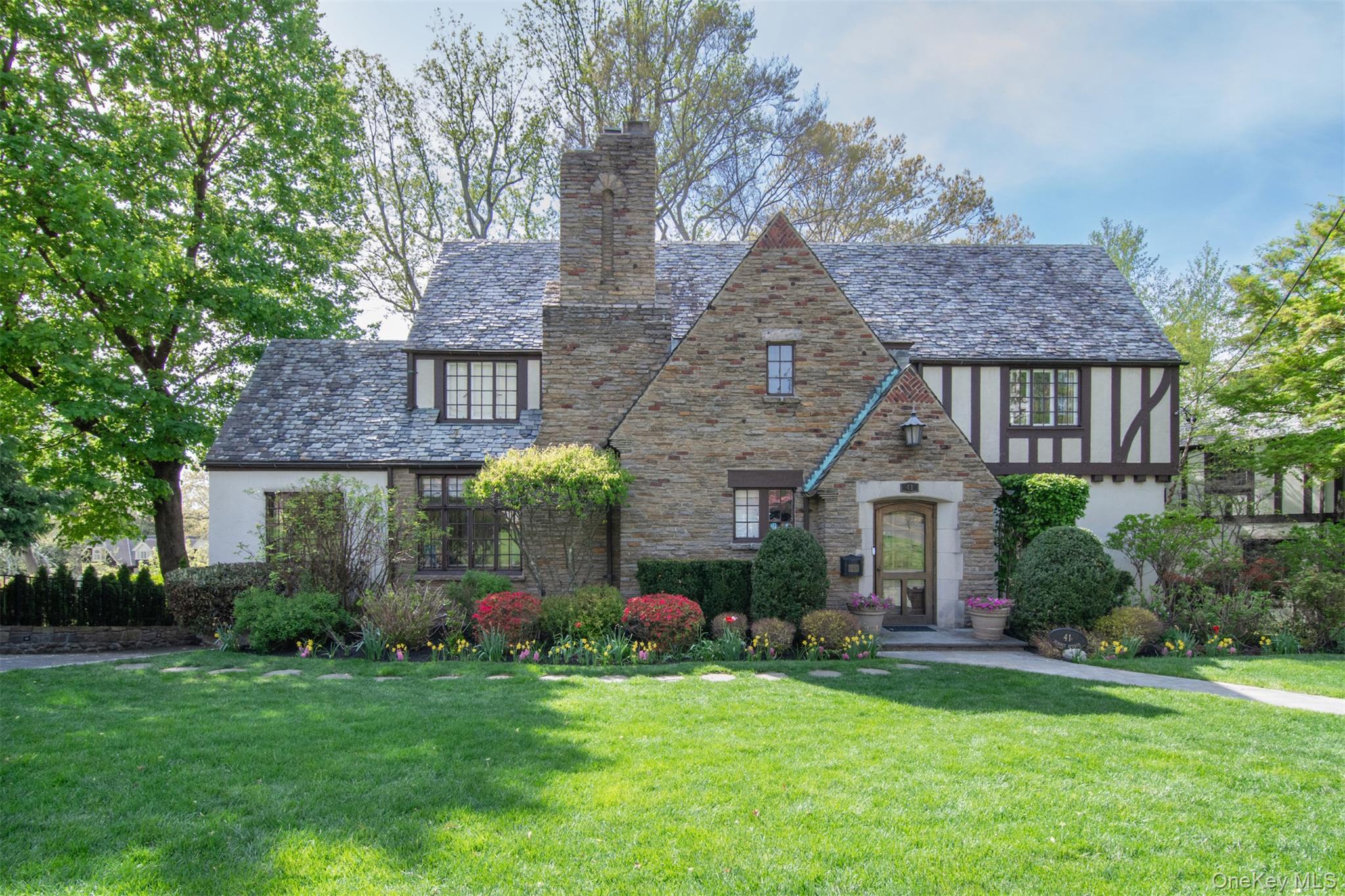 Welcome to 41 Summit, a beautifully maintained 1920's George Root Tudo...