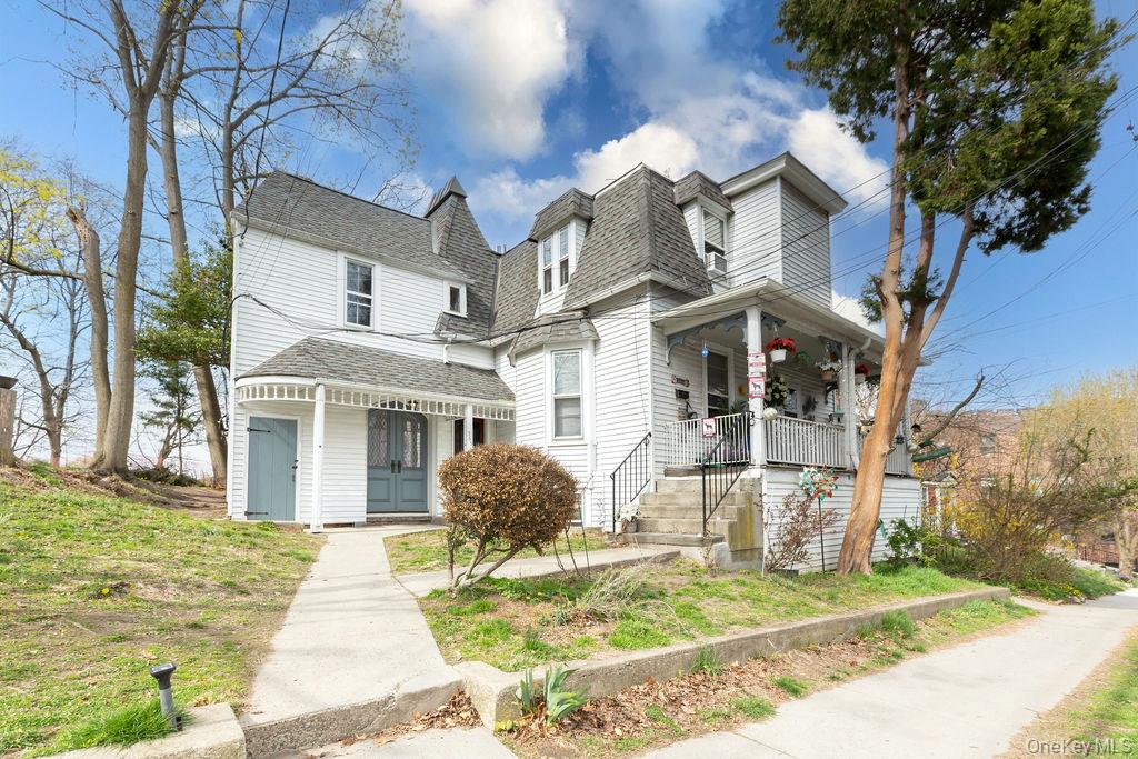 Exceptional four-family investment opportunity in the heart of Dobbs F...