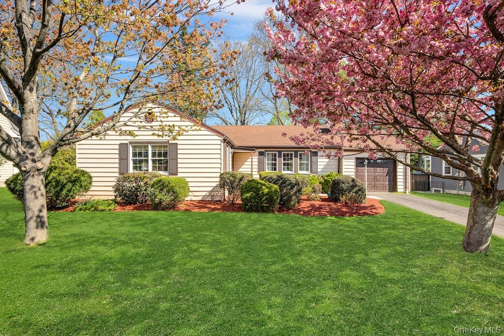 Welcome to effortless living in the coveted Holbrooke Manor. This sun-...