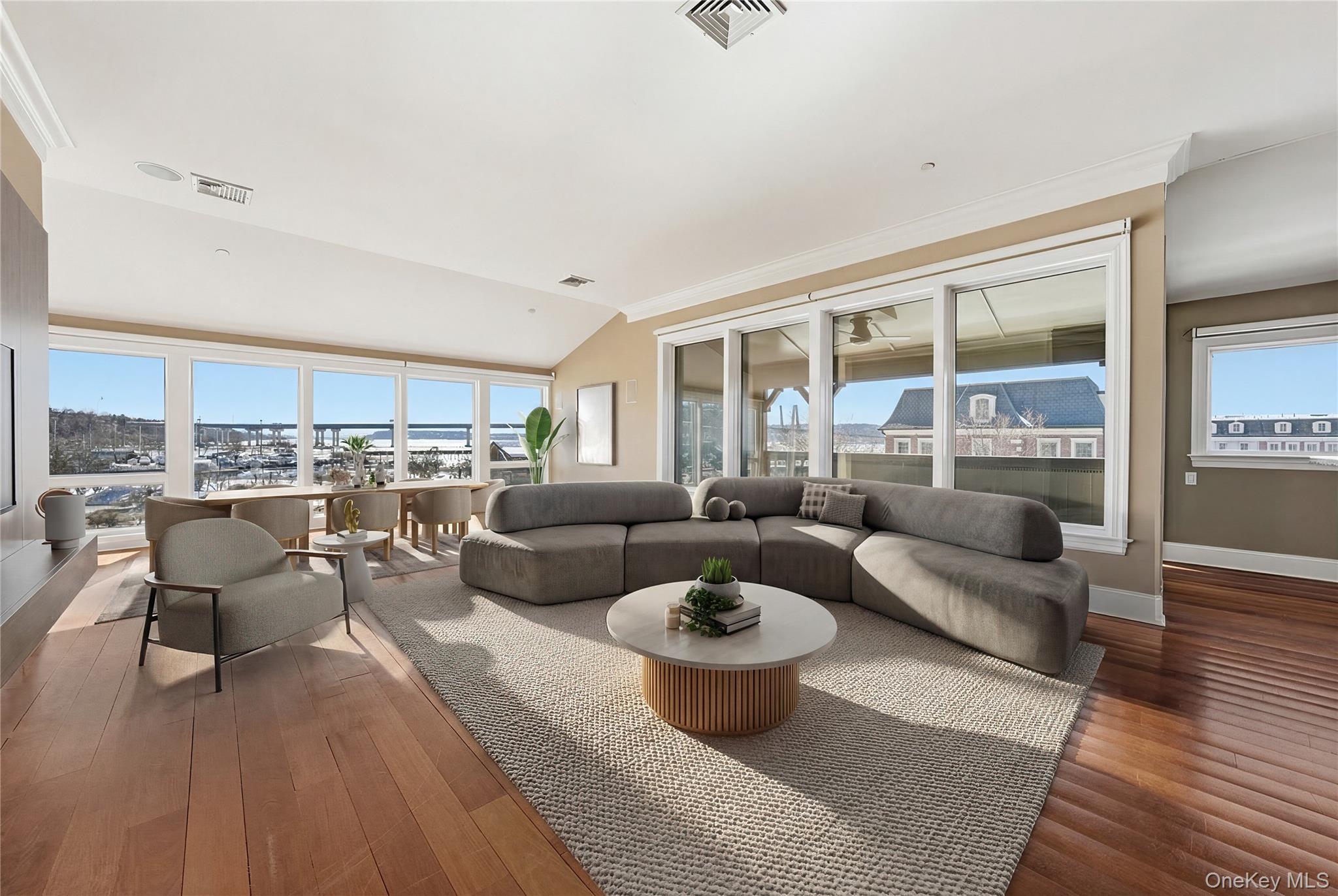 Welcome to your waterfront penthouse in the Stone House at Hudson Harb...