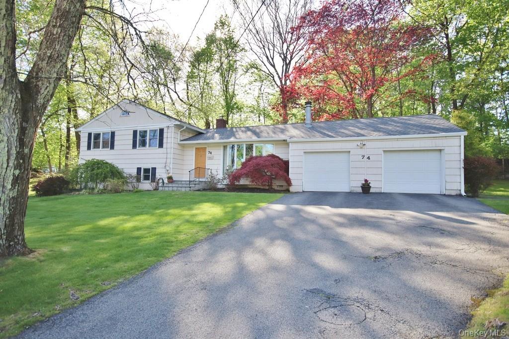 Nestled in a quiet neighborhood near a local park, this wonderful spli...