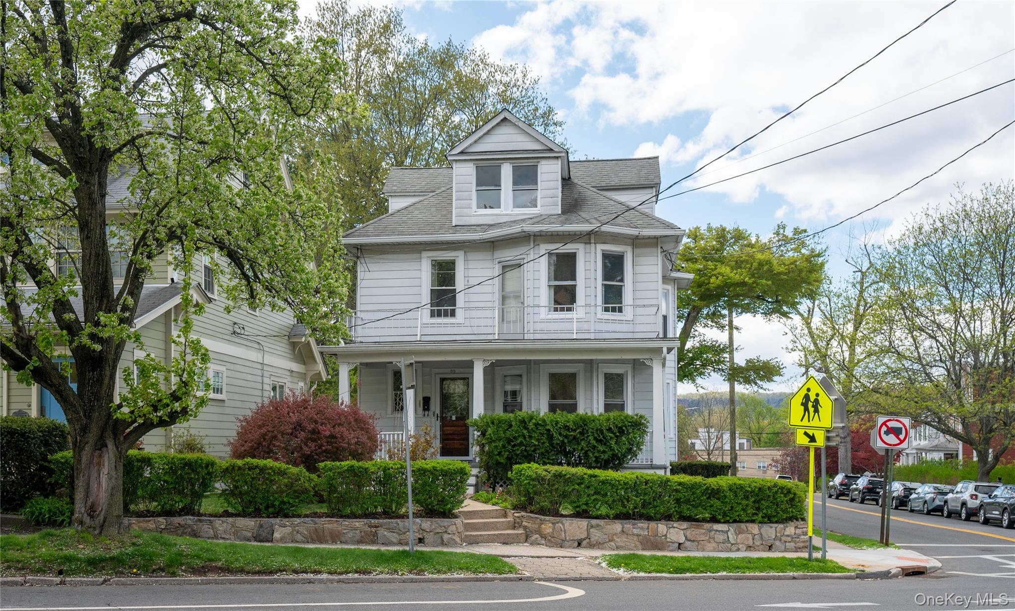 Welcome to 58 Farragut Avenue, a charming circa 1922 two-family home n...