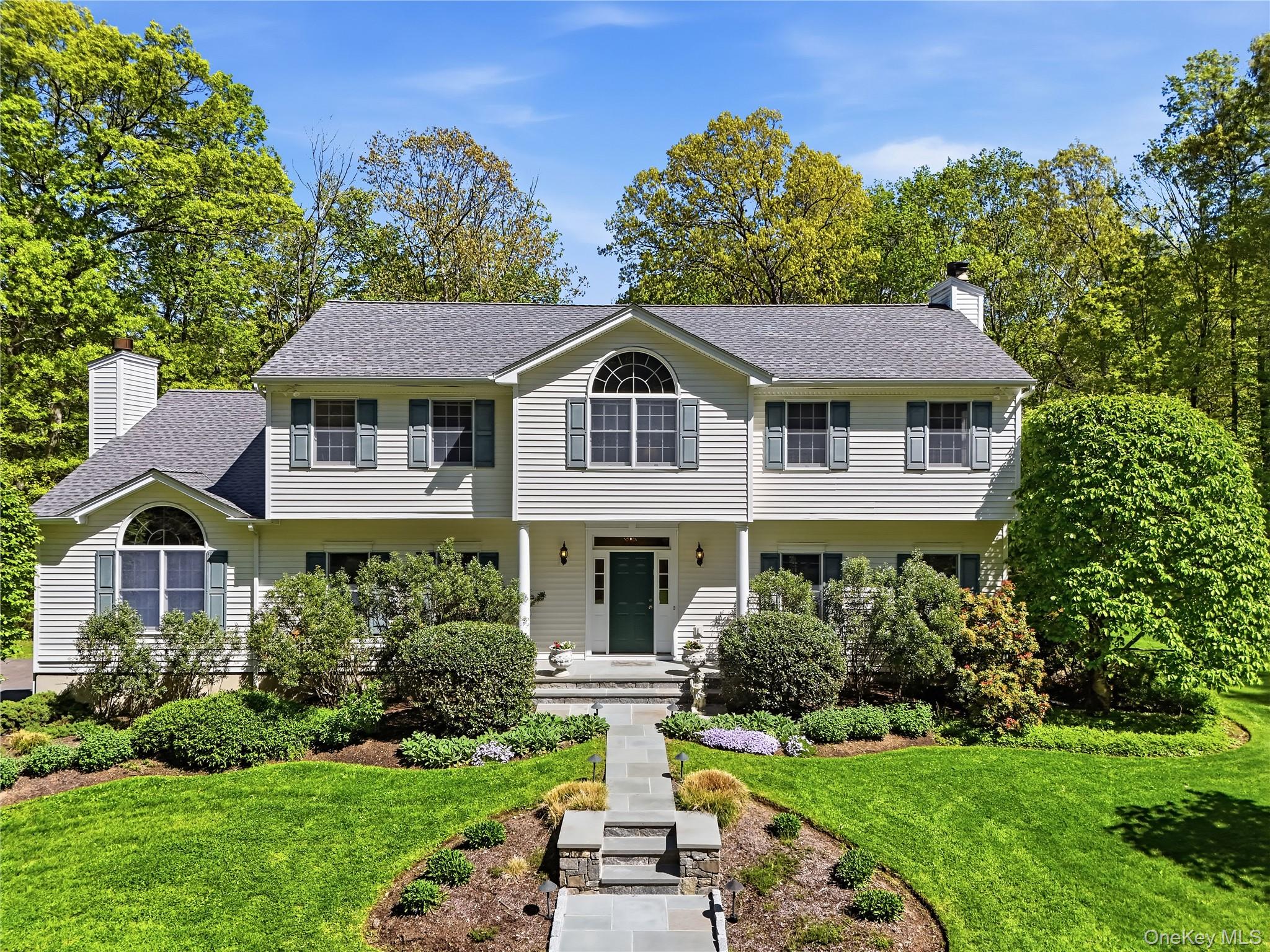 Turnkey and beautifully updated, this exceptional Center Hall Colonial...