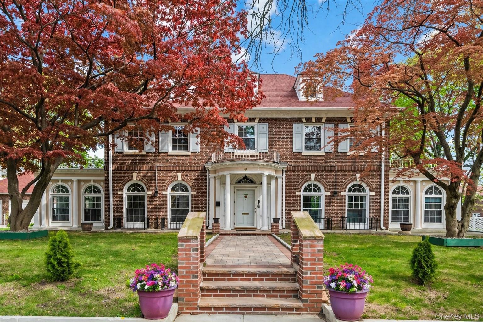 Sun drenched elegance meets timeless Colonial charm in this stunning,...
