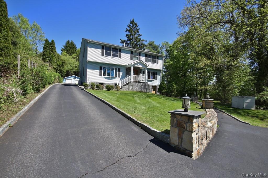 Set back from the road for added privacy, this beautifully updated Col...