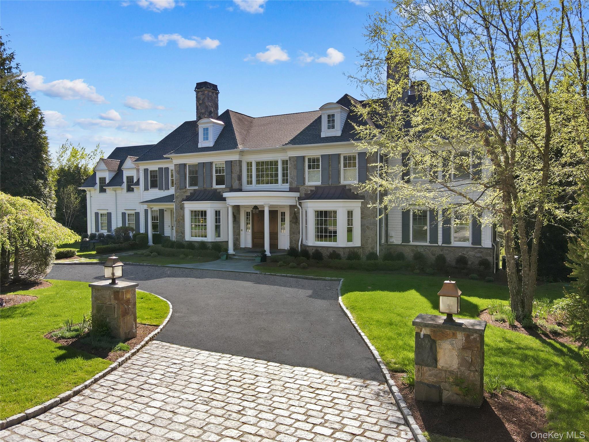 Elevate your lifestyle in this striking 9,800-square-foot masterpiece,...