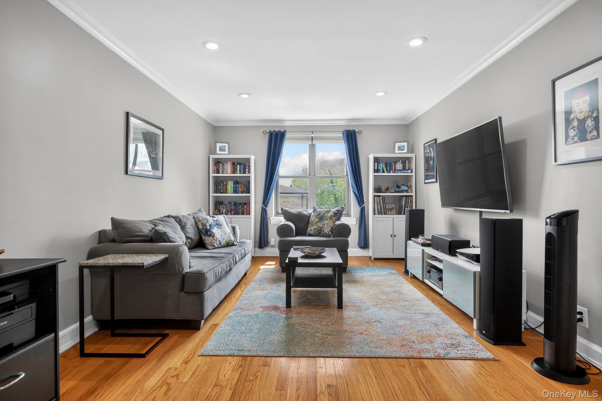Welcome to this bright and beautifully maintained top-floor co-op in t...