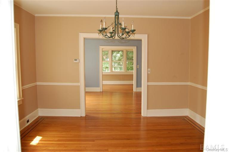 Location, Location! This charming Mediterranean style Two Family Duple...