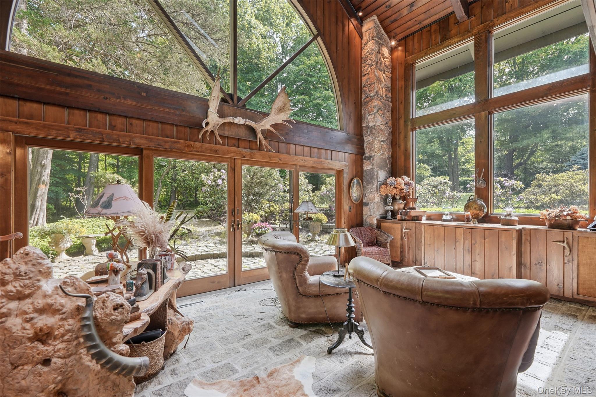 This one-of-a-kind 5 bedroom, 5 full bathroom rustic California inspir...