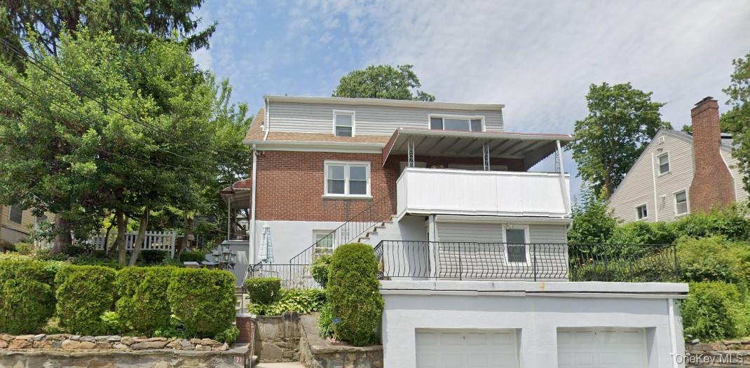 This two family property features a spacious 3 bedroom, 2 bathroom uni...