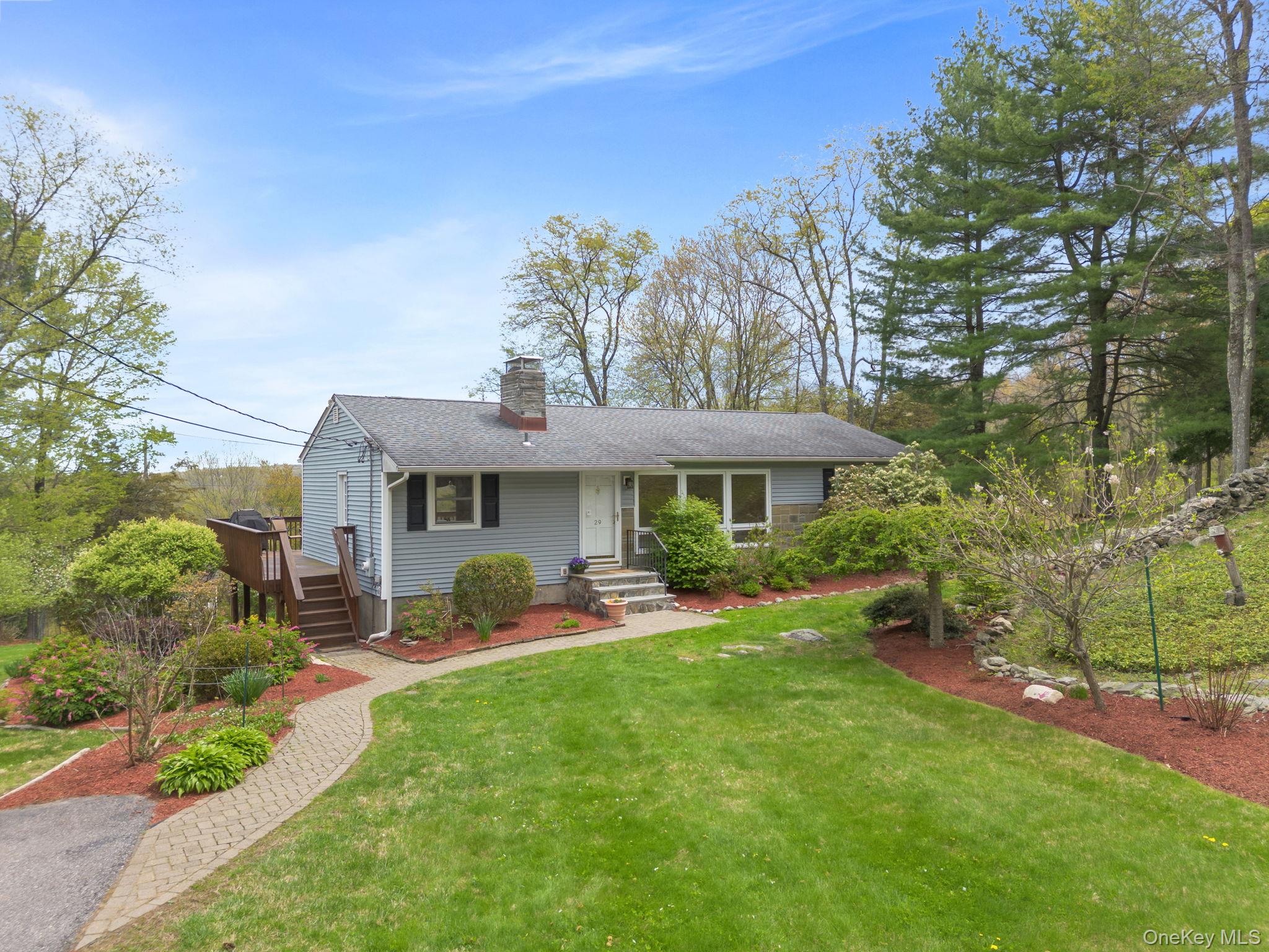 Charming 3-bedroom, 1-bath ranch set on over an acre in the peaceful c...