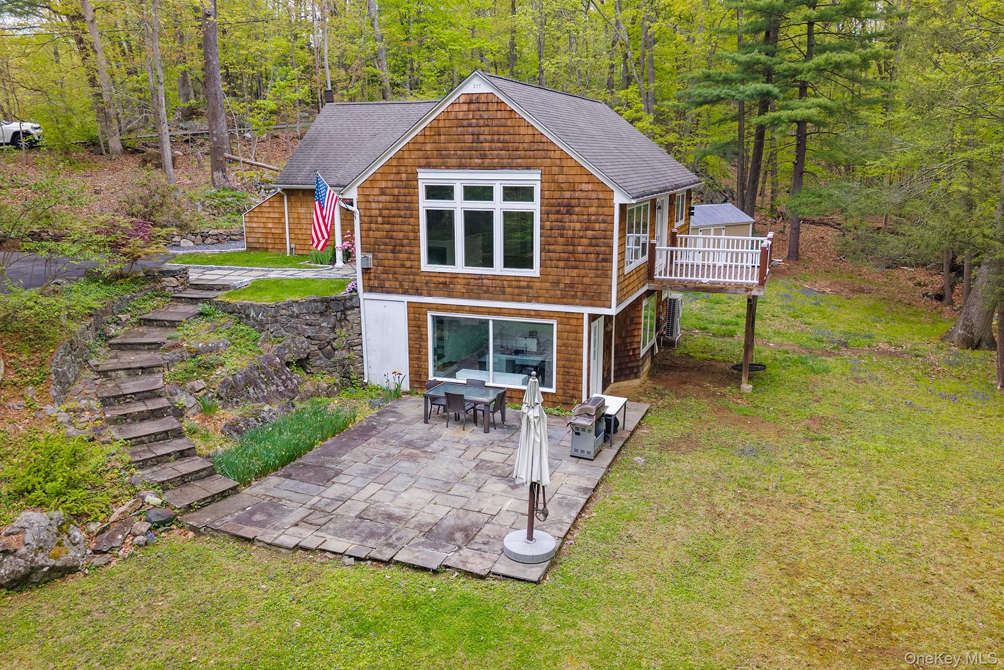 Tucked away in a peaceful setting, this home offers beautiful treetop...