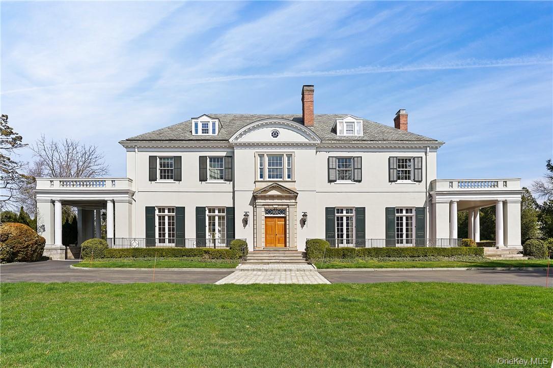 This meticulously renovated Murray Hill Estate welcomes sophisticated...
