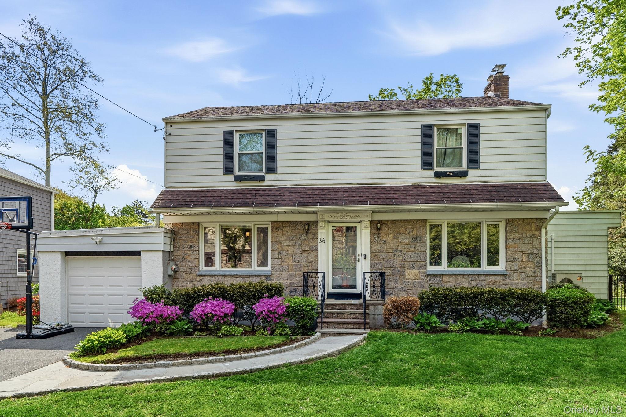 A rare blend of scale and style, this move in ready center hall Coloni...