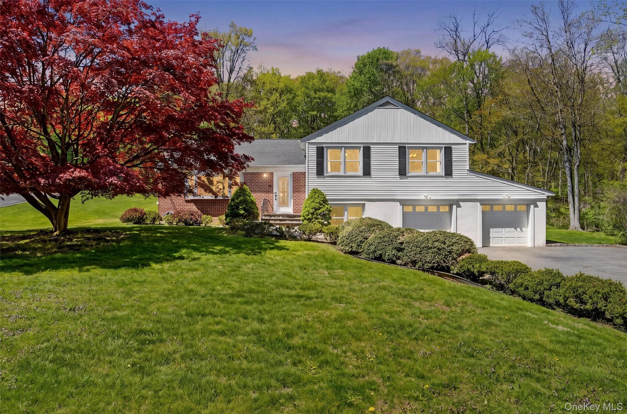 Welcome to 8 Aspen Way - a beautifully maintained split-level home in...