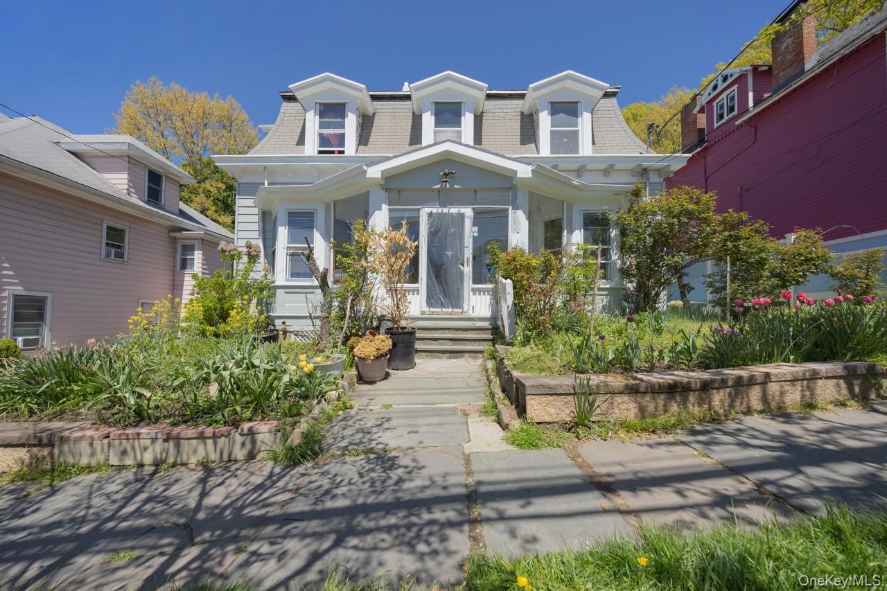 Legal 2-family opportunity in the heart of Ossining offering exception...