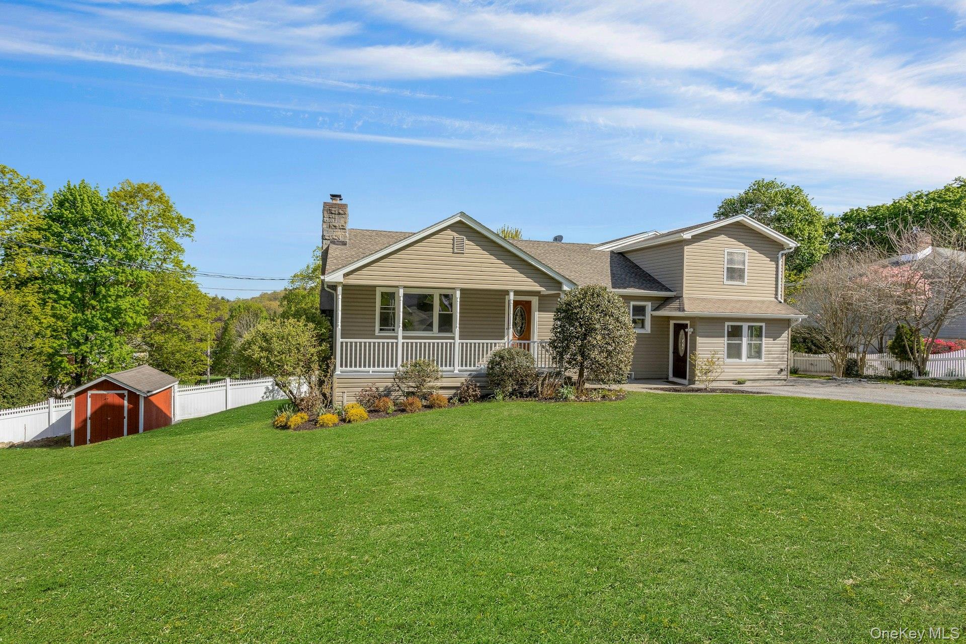 Bedford Hills Beauty! A front porch welcomes you to this light, bright...