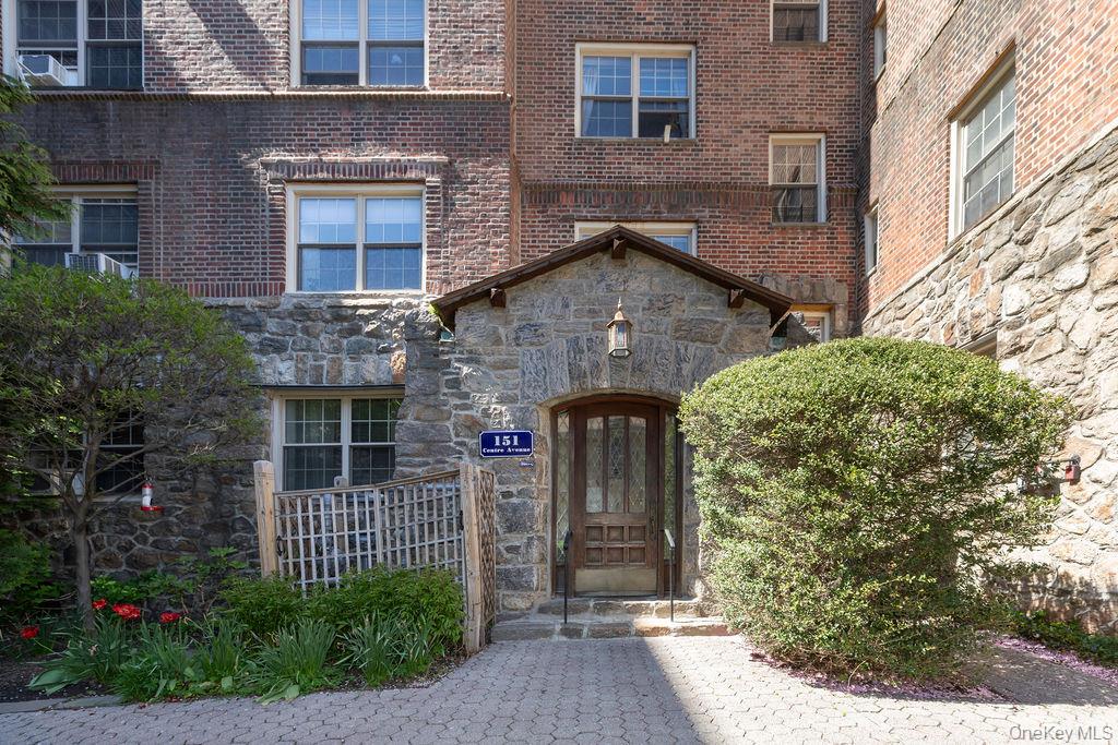 This unique property at 151 Centre Avenue is a rare duplex formed by c...
