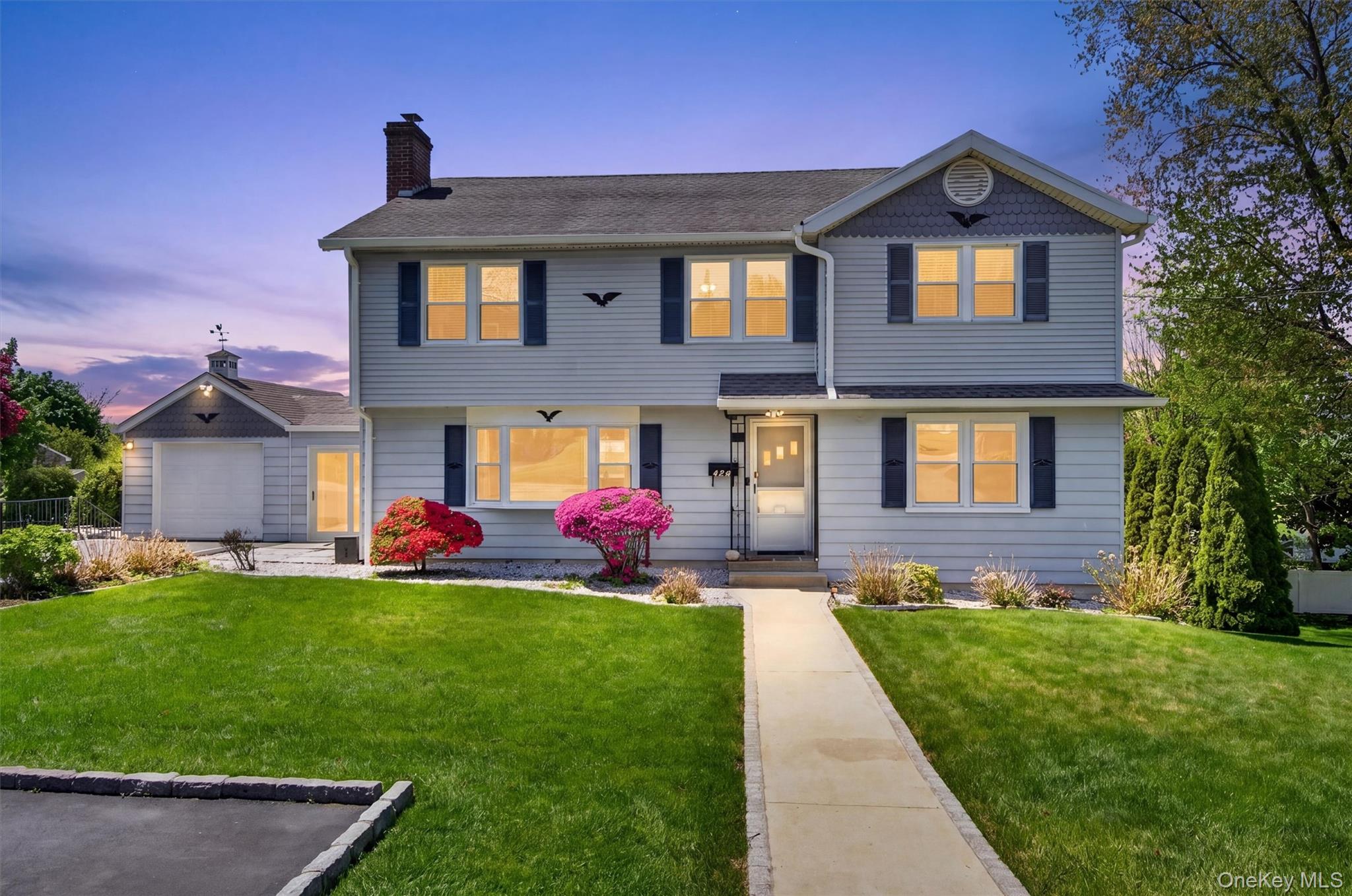 Welcome home to 121 Marietta Ave!  Expansive Colonial, situated on a d...