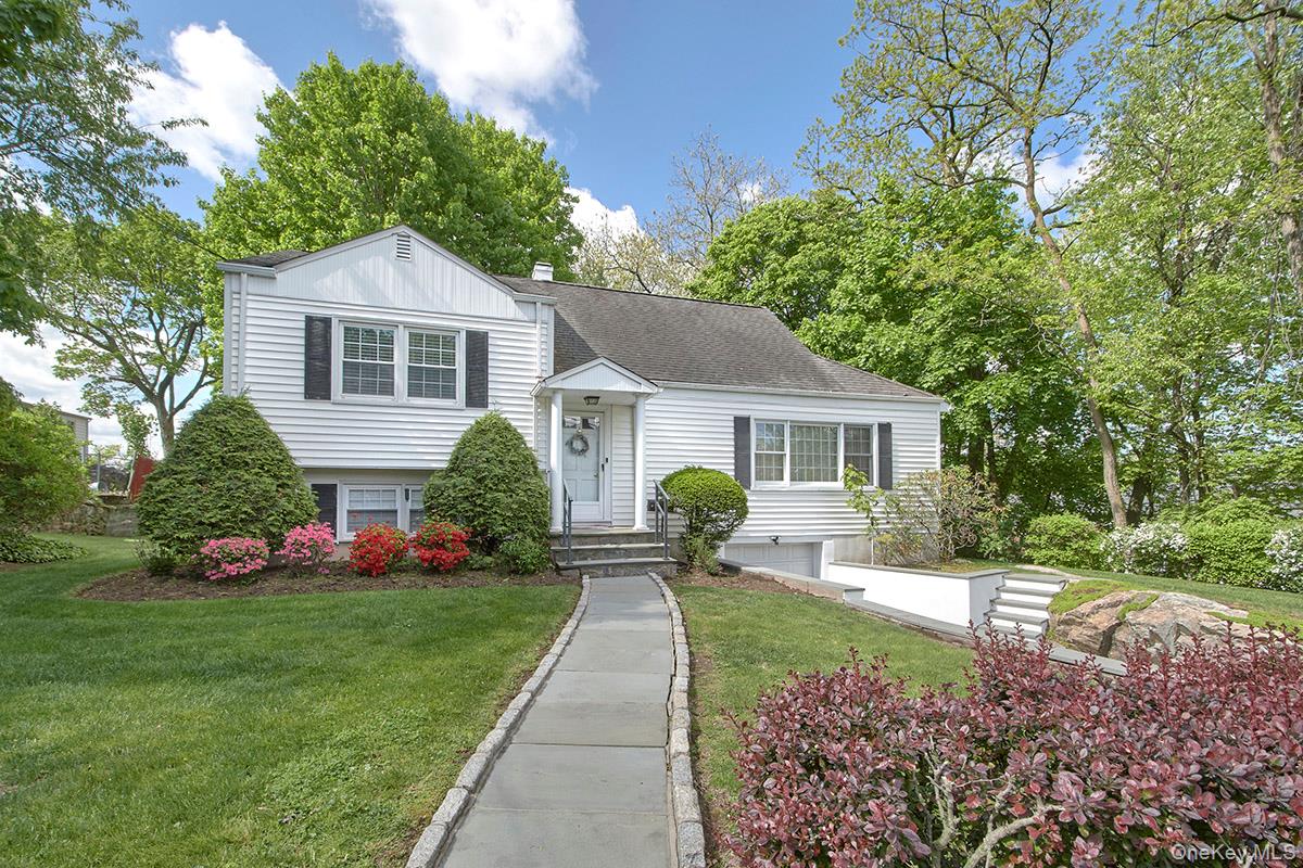 One-of-a-Kind!   Charming three bedroom split level home situated on a...