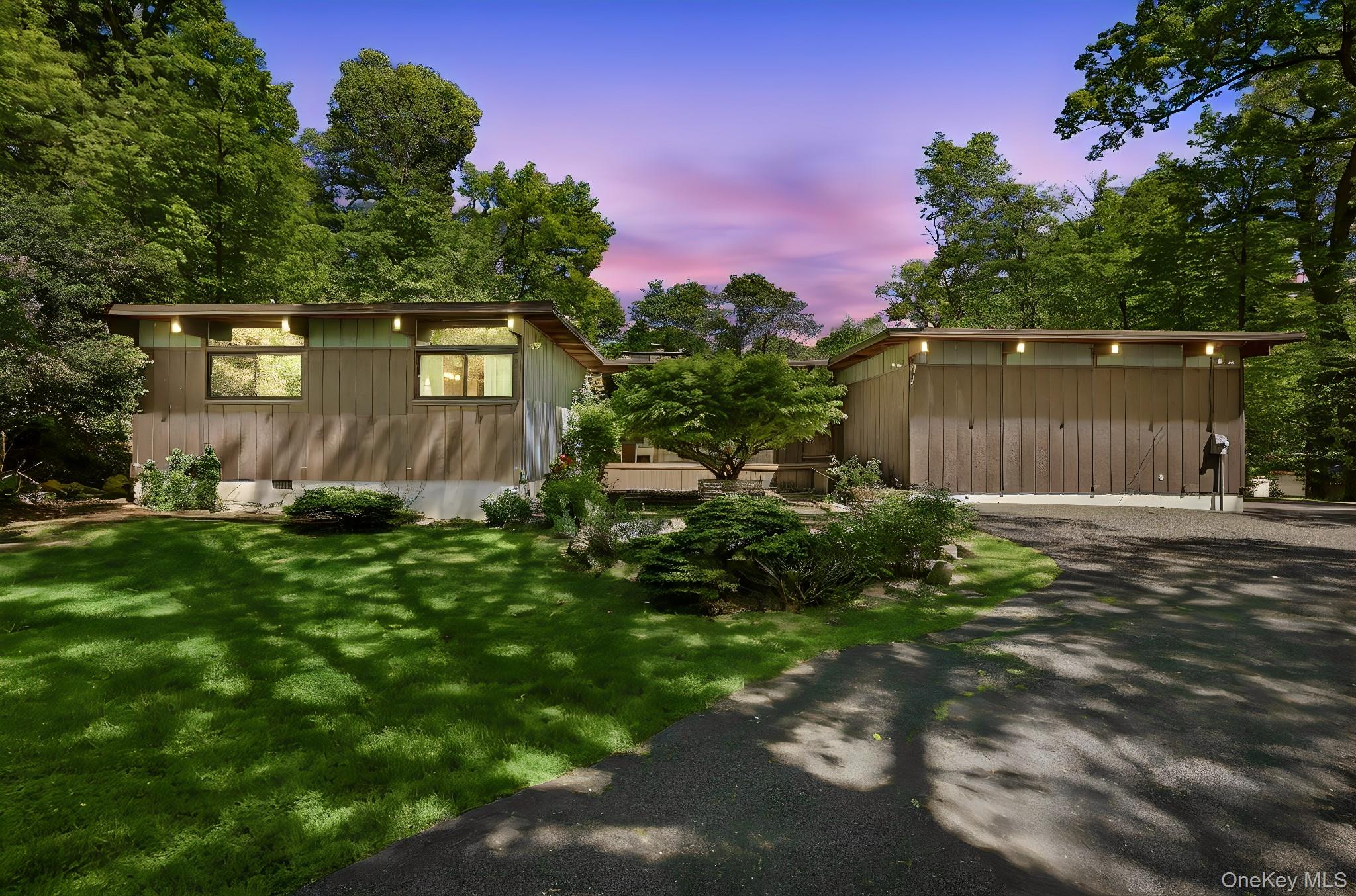 Nestled on nearly 1.5 acres of exquisitely landscaped grounds, this ex...