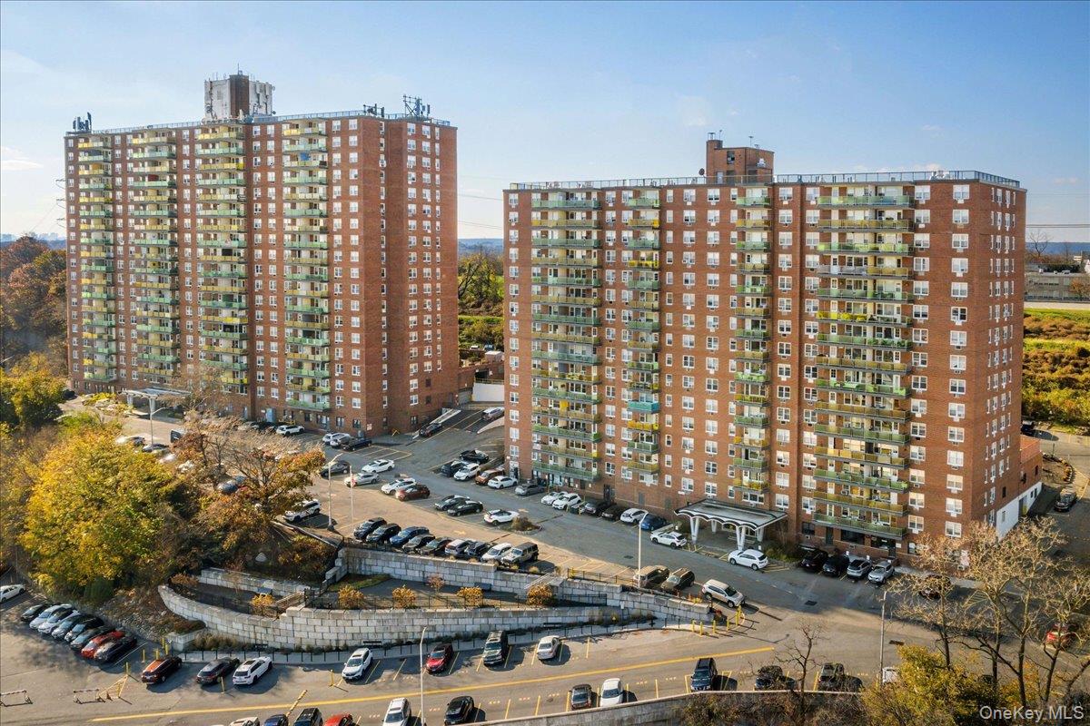 Welcome to 1841 Central Park Avenue, Unit 19L — a spacious top-floor 2...