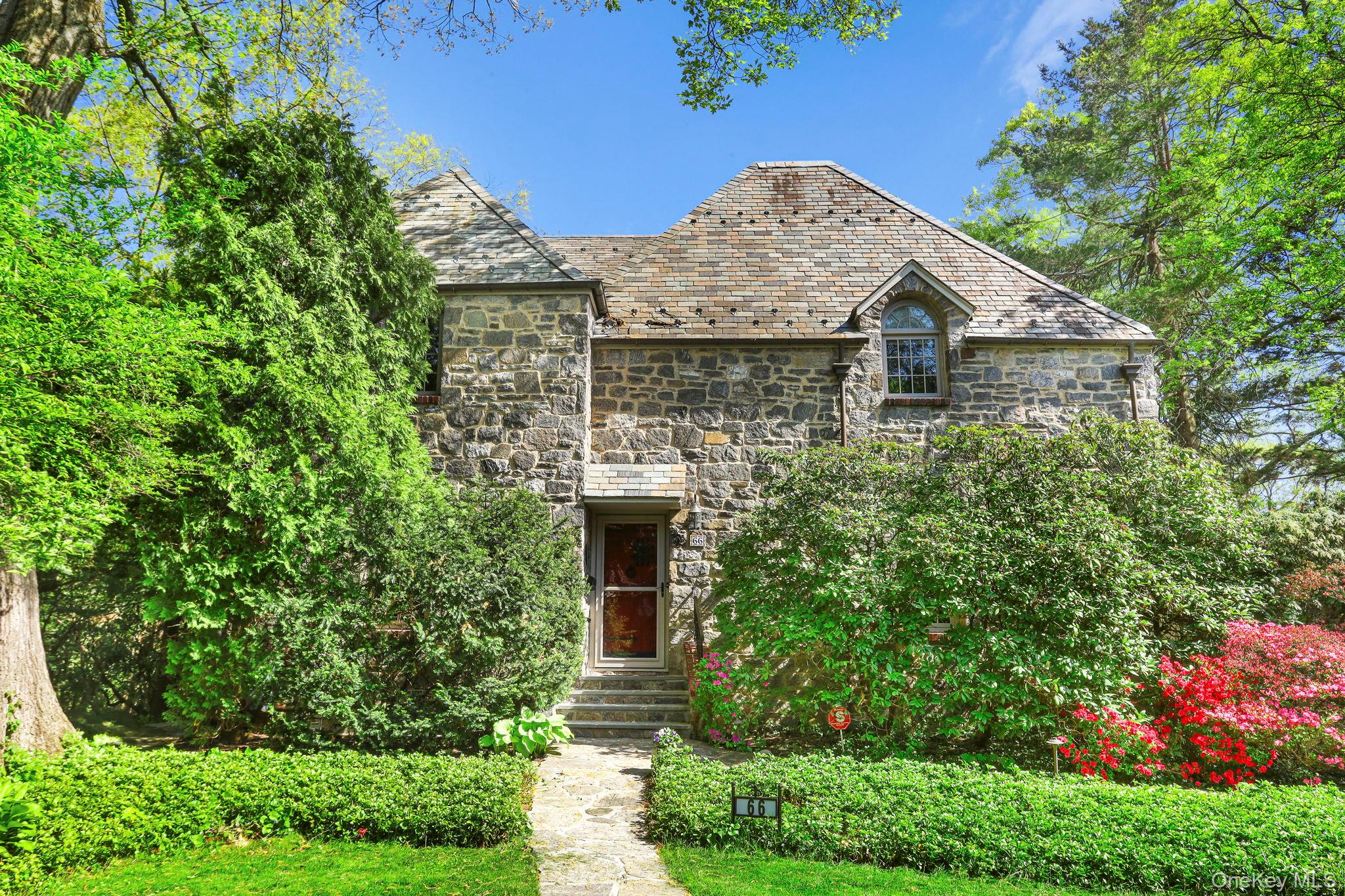Welcome to this timeless 1926 stone and stucco Colonial, where classic...