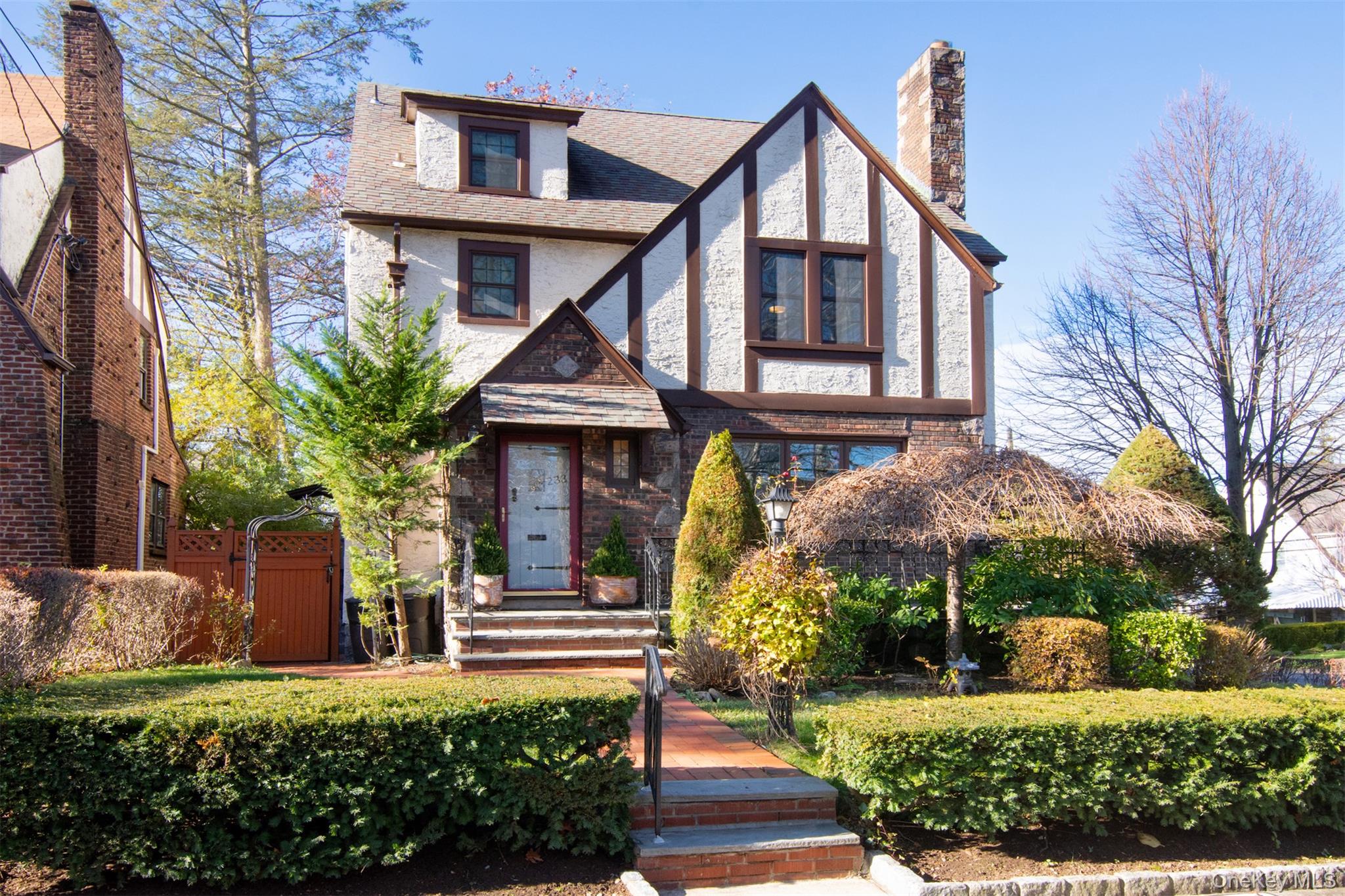 Welcome to this beautifully maintained Tudor-style home, perfectly sit...
