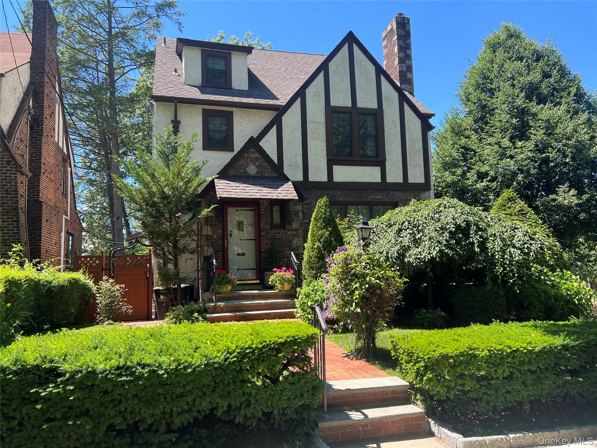 Welcome to this beautifully maintained Tudor-style home, perfectly sit...