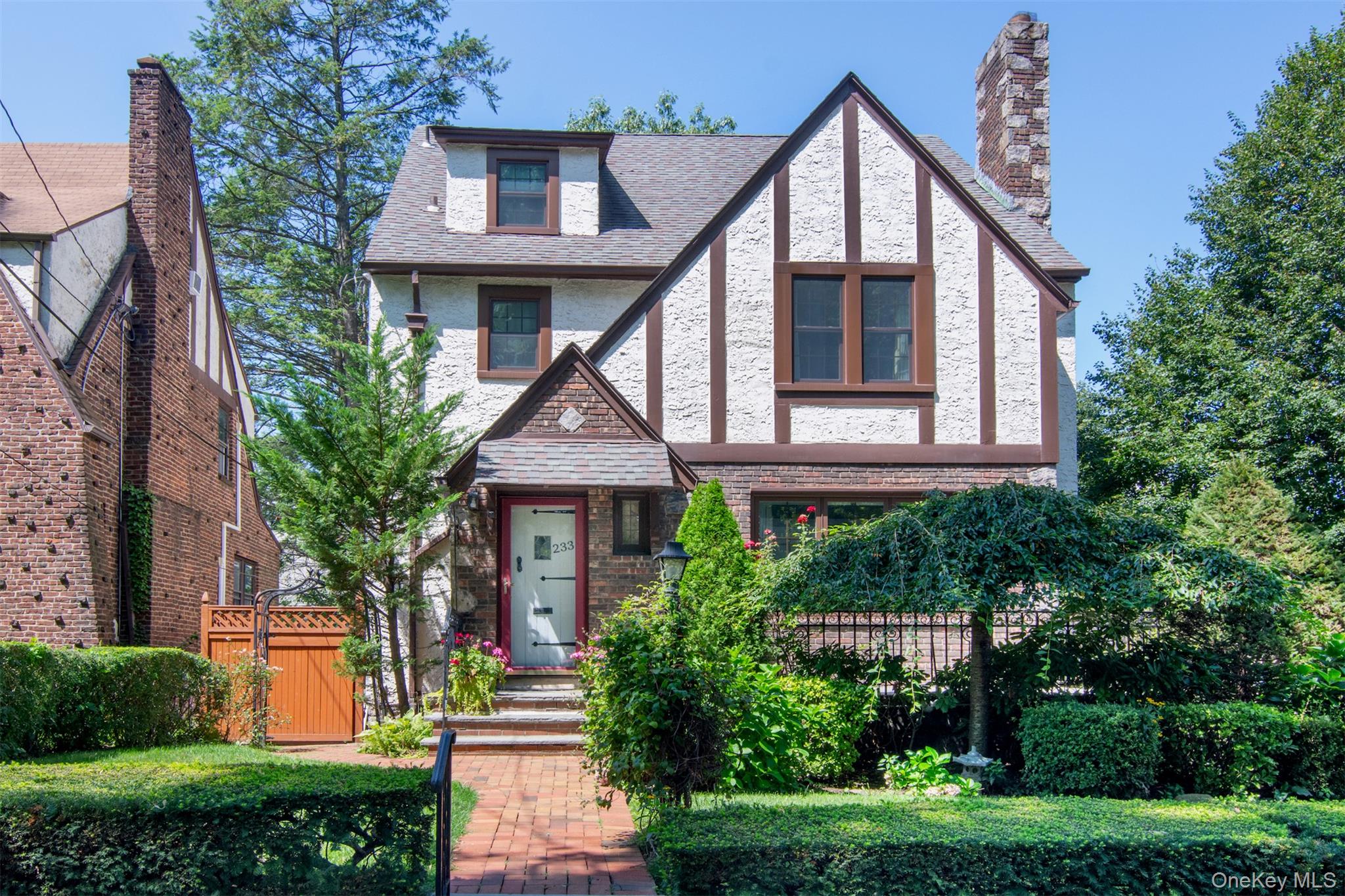 Welcome to this beautifully maintained Tudor-style home, perfectly sit...