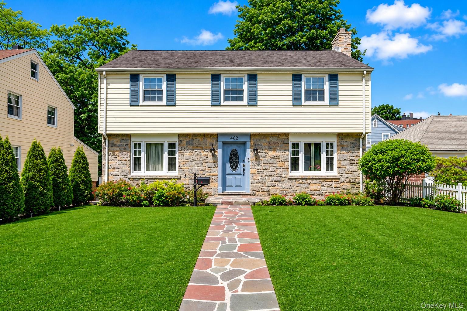 This charming Colonial seamlessly blends timeless character with moder...