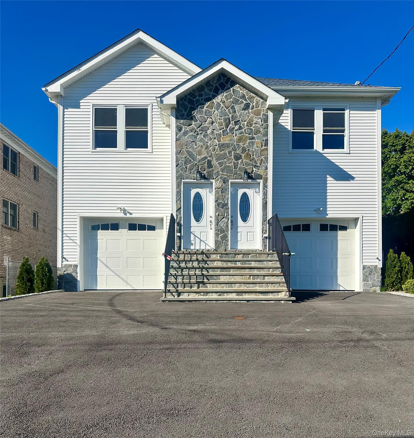 Spacious, brand-new and sun-filled 3-bedroom, 2-bath residence in a de...