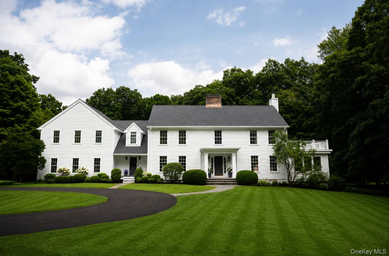 Cozy-chic country Colonial thoughtfully reimagined from top to bottom...