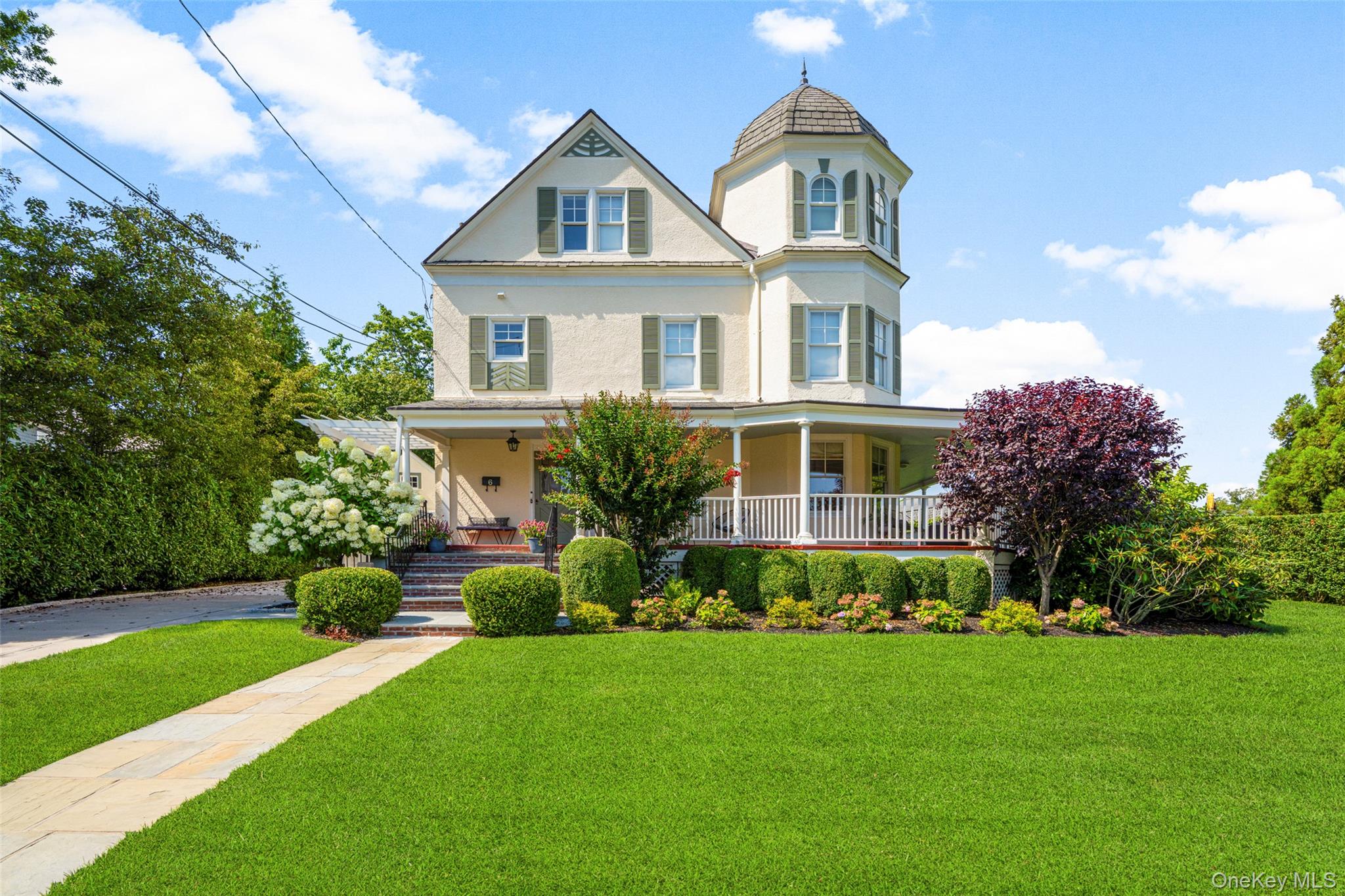 Welcome to this elegant 1890 Victorian set on one of the prettiest str...