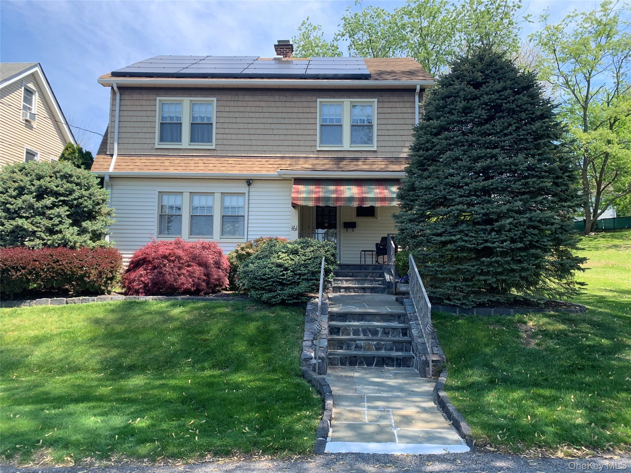 Tranquility Awaits in this beautifully updated colonial in a quiet nei...