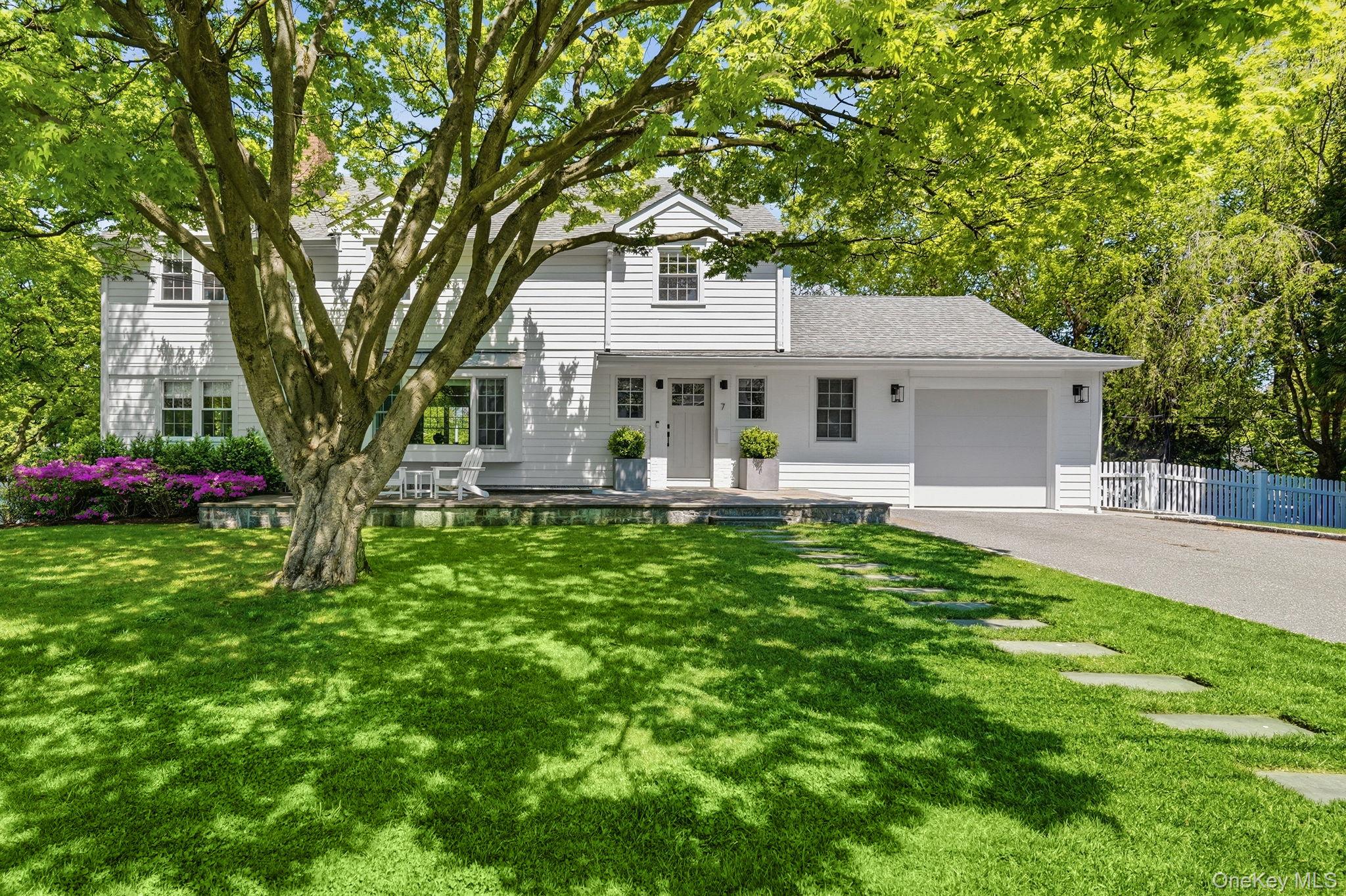 Classic curb appeal meets modern comfort in this beautifully updated C...