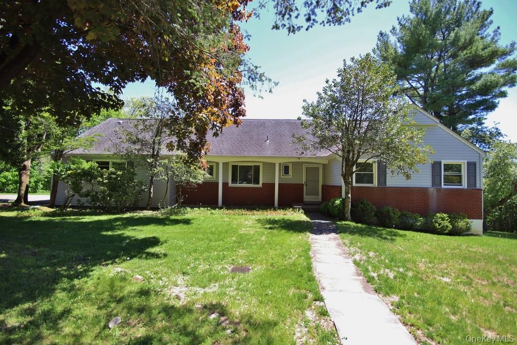 Located in the highly sought-after Chilmark neighborhood of Briarcliff...