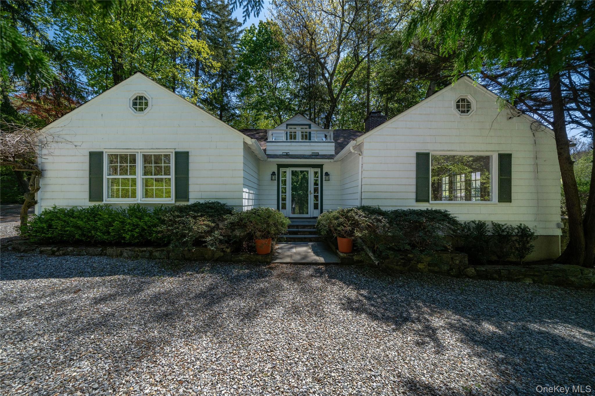 Set far back from the road in a private and peaceful setting, this bea...