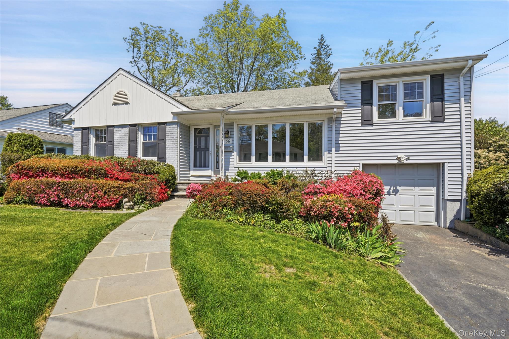 Nestled on a serene cul-de-sac in the heart of Scarsdale P.O., 36 Fred...