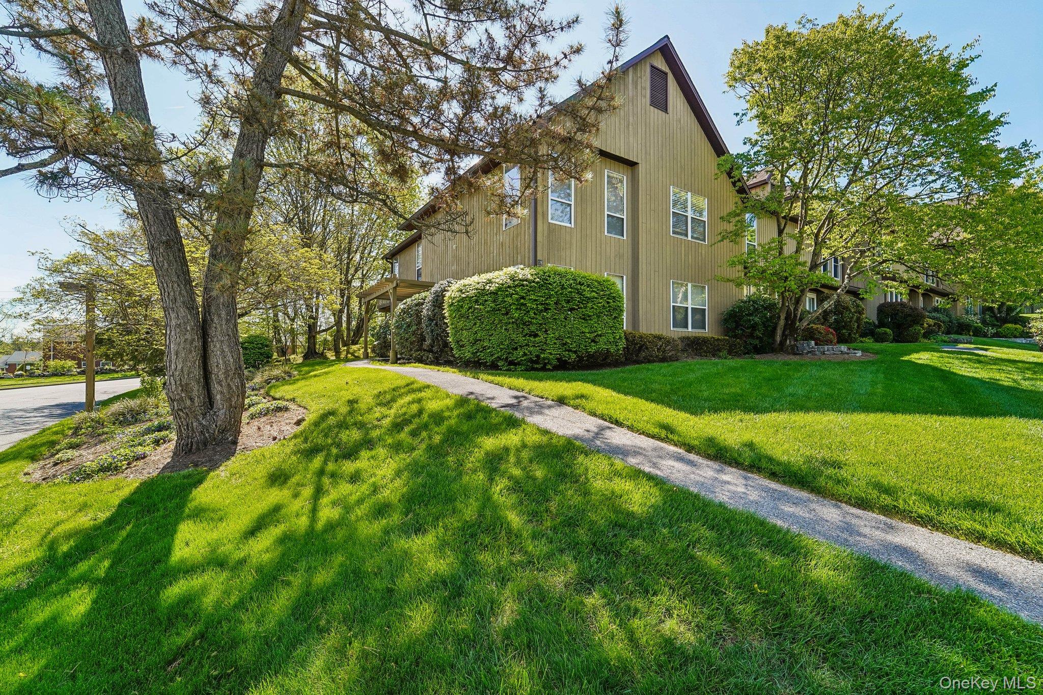 Experience living in this beautifully appointed second-floor condo loc...
